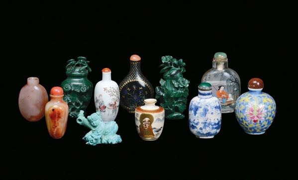 Ten snuff bottles made of different materials and a turquoise figure, China, Qing Dynasty, 19th century