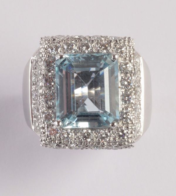 An acquamarine and diamond cluster ring
