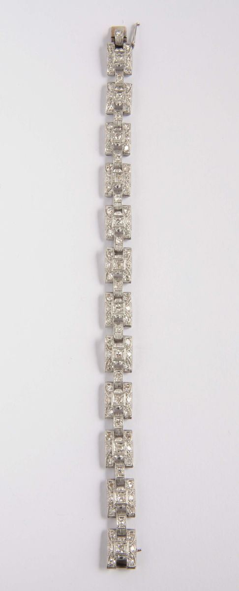 An old-cut diamond and platinum bracelet. 1930 circa