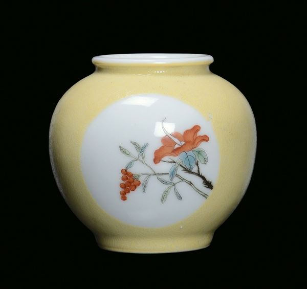 A small yellow porcelain vase with polychrome floral decoration, China, 20th centuryMark and the period