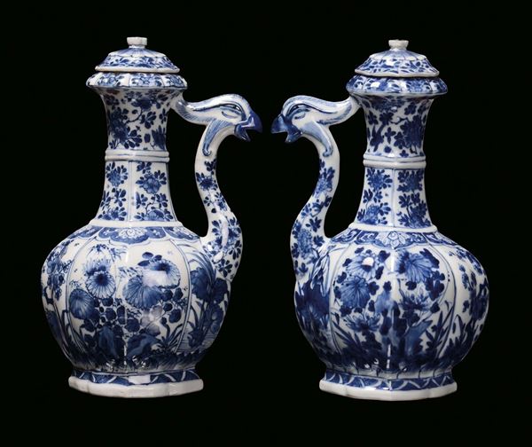 A pair of white and blue porcelain teapots, China, Qing Dynasy, Kangxi Period (1662-1722)nozzles with phoenix heads