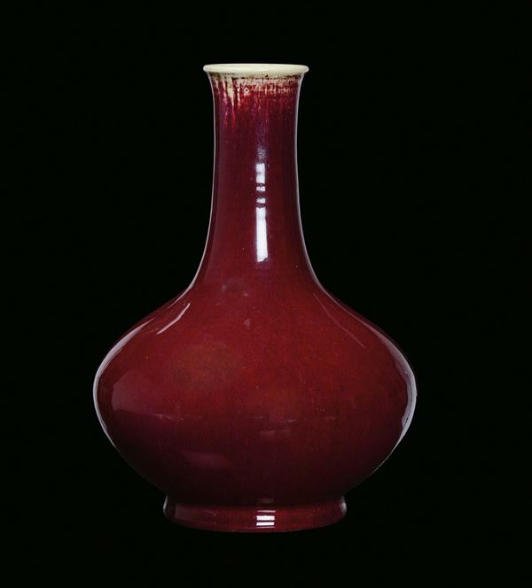 An ampoule oxblood red porcelain vase, China, Qing Dynasty, 19th century