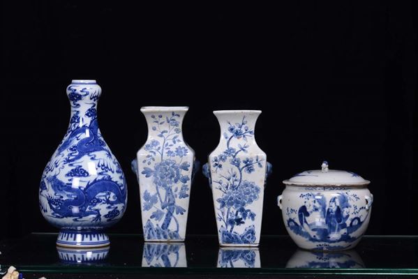A group of four vases with white and blue decoration, China, 20th century