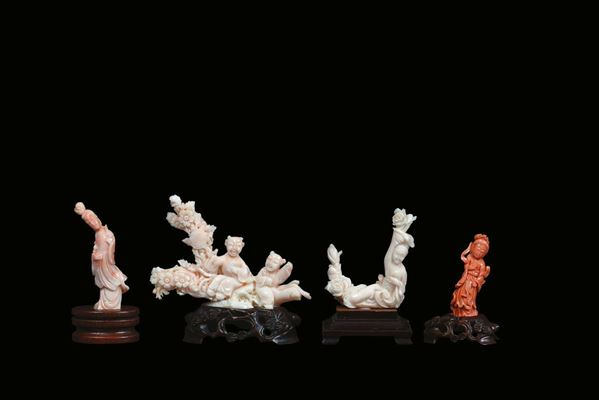 Four small coral figures, China, early 20th century