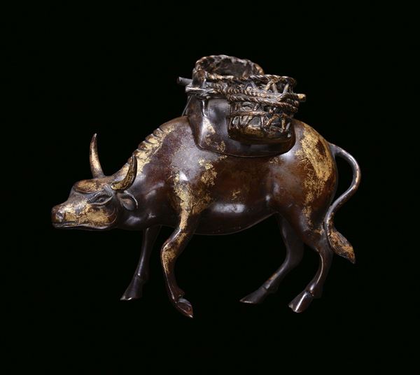 A bronze censer with golden brush strokes representing an ox with basket, China, Qing Dynasty, Qianlong Period (1736-1795)
