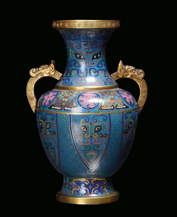 A cloisonné bronze vase with gilt handles and rim, China, Qing Dynasty, 19th century