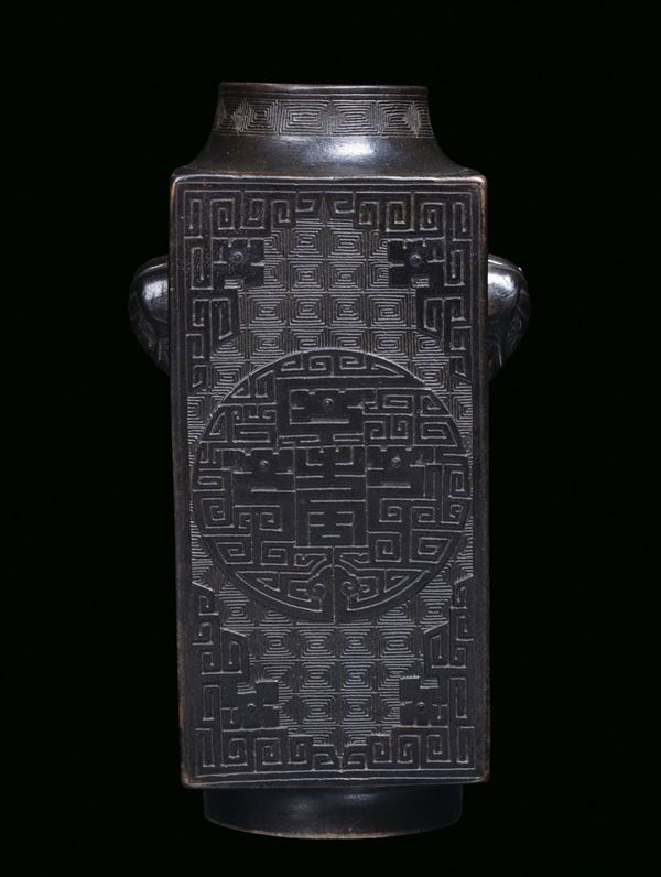 A rare and fine squared porcelain imitation bronze square vase decorated with archaic motives, China, Qing Dynasty, Jiaqing Period (1796-1820)A similar vase was published on Chinese Ceramic from Meyintang Collection Voll. II pag. 35 . r.krahl