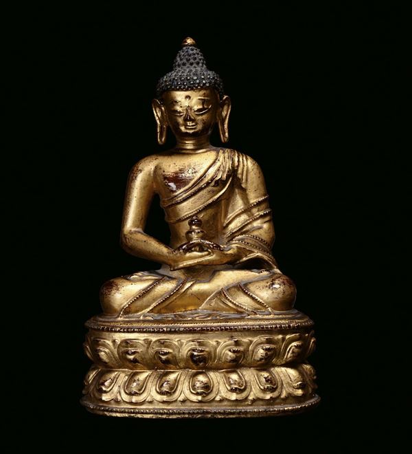 A gilt bronze figure of Amitayus, China, Qing Dynasty, Kangxi Period (1662-1722)