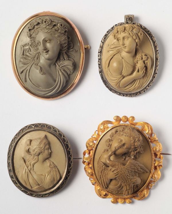 A 19th century four lava cameos gold and silver mount