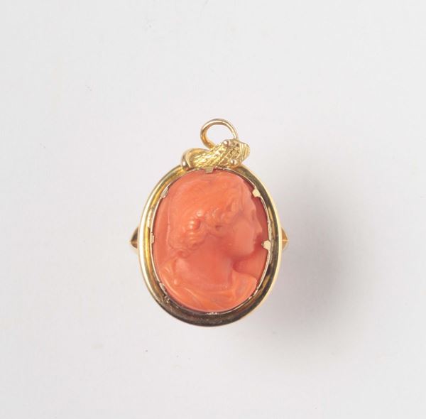 A coral carving cameo ring, gold mount