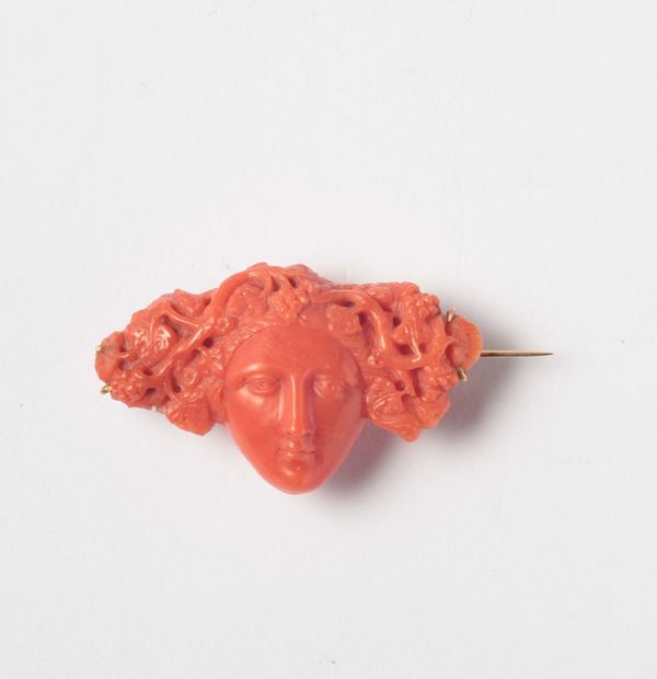 A 19th century bacchante coral carving brooch