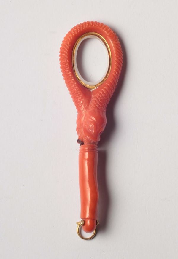 A 19th century coral carving loop. Box