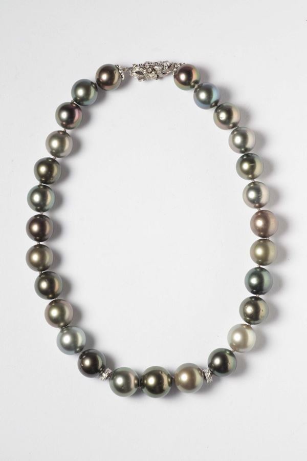 A cultured pearl necklace and diamond clasp. Accompanied by report of R.A.G