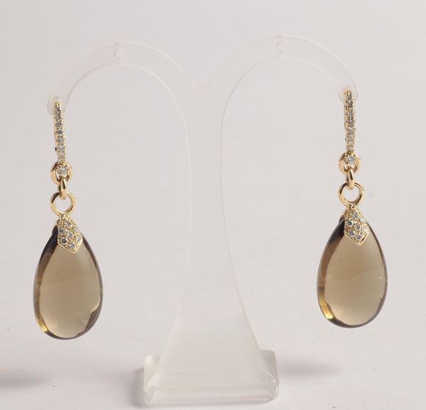A pair of fumet quartz and diamond earpendants