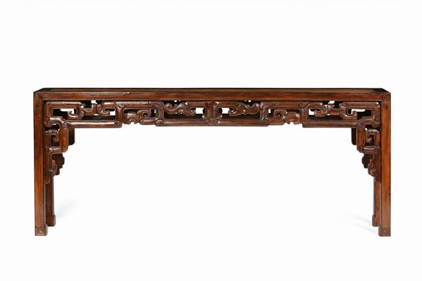 An elm console with notches, China, Qing Dynasty, 19th century