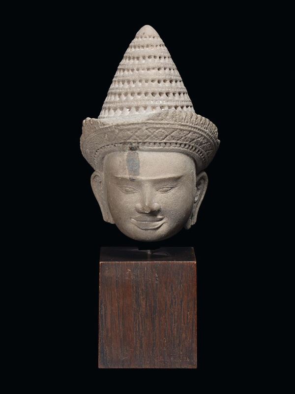 A Khmer stone head, Indochina, 12th century