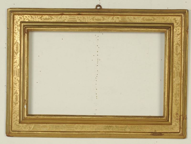 Cornice a cassetta bulinata e dorata. Italia Centrale XVII secolo  - Auction Antique Frames from 16th to 19th century - Cambi Casa d'Aste