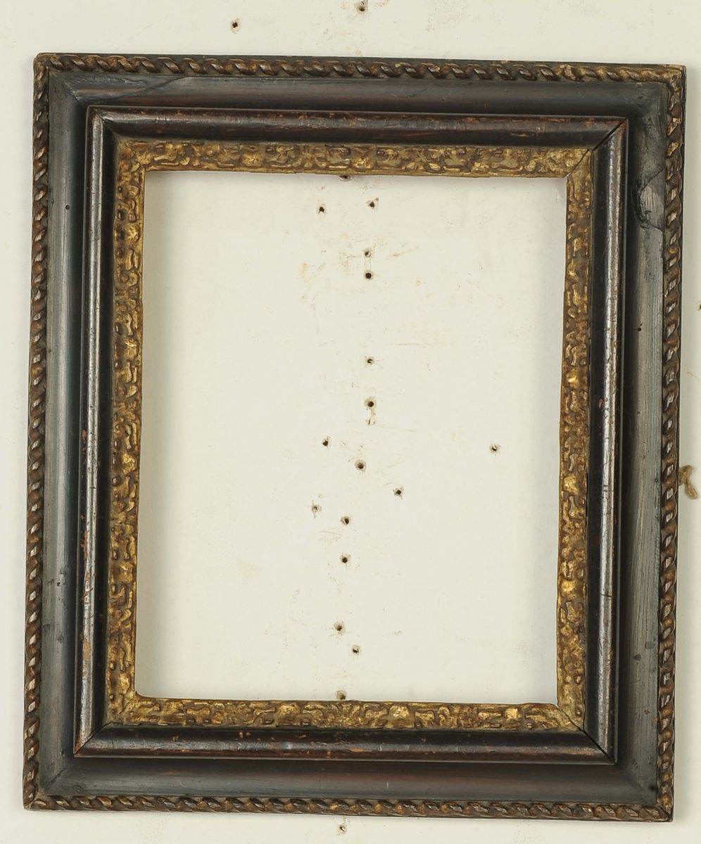 Cornice nera con intagli dorati. Italia Centrale XVIII secolo - Asta Cornici  Antiche dal XVI al XIX