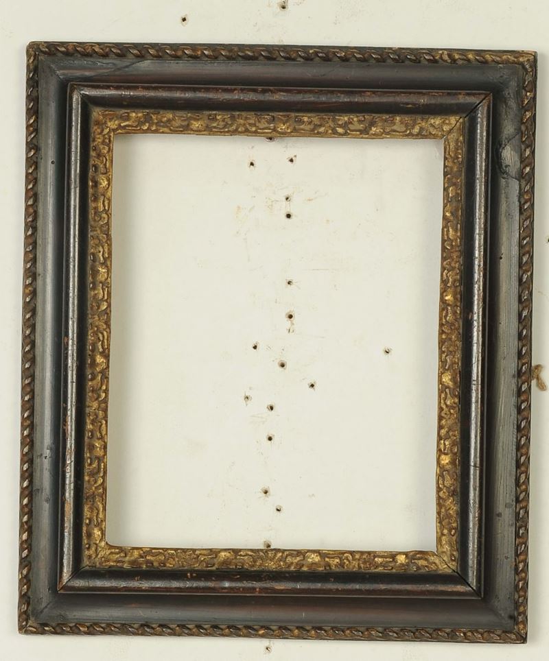 Cornice nera con intagli dorati. Italia Centrale XVIII secolo  - Auction Antique Frames from 16th to 19th century - Cambi Casa d'Aste