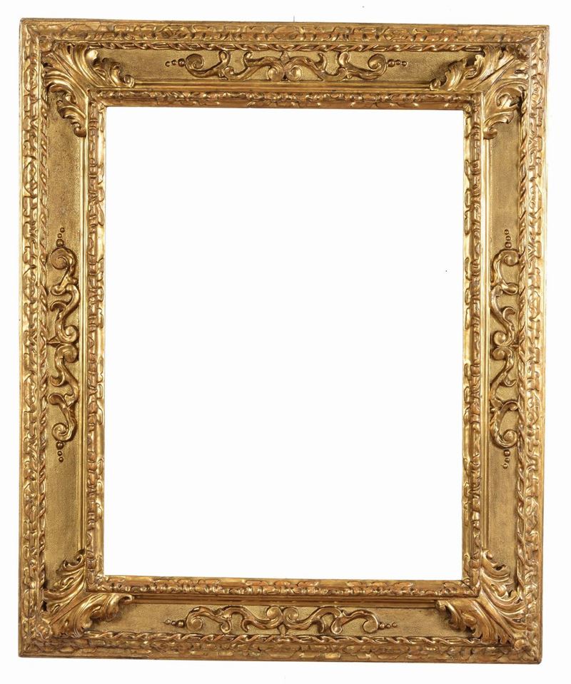 Importante cornice in legno intagliato ed interamente dorato, Roma XVII secolo  - Auction Antique Frames from 16th to 19th century - Cambi Casa d'Aste