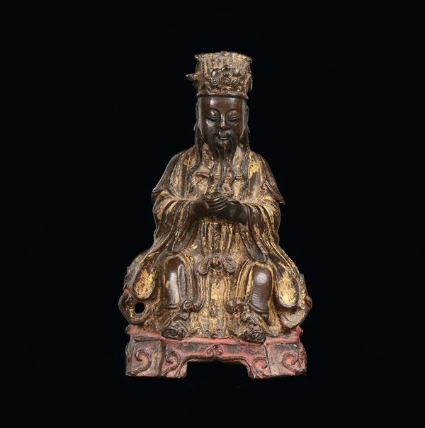 A bronze figure of Tao with gold plate traces, China, Ming Dynasty, 17th century