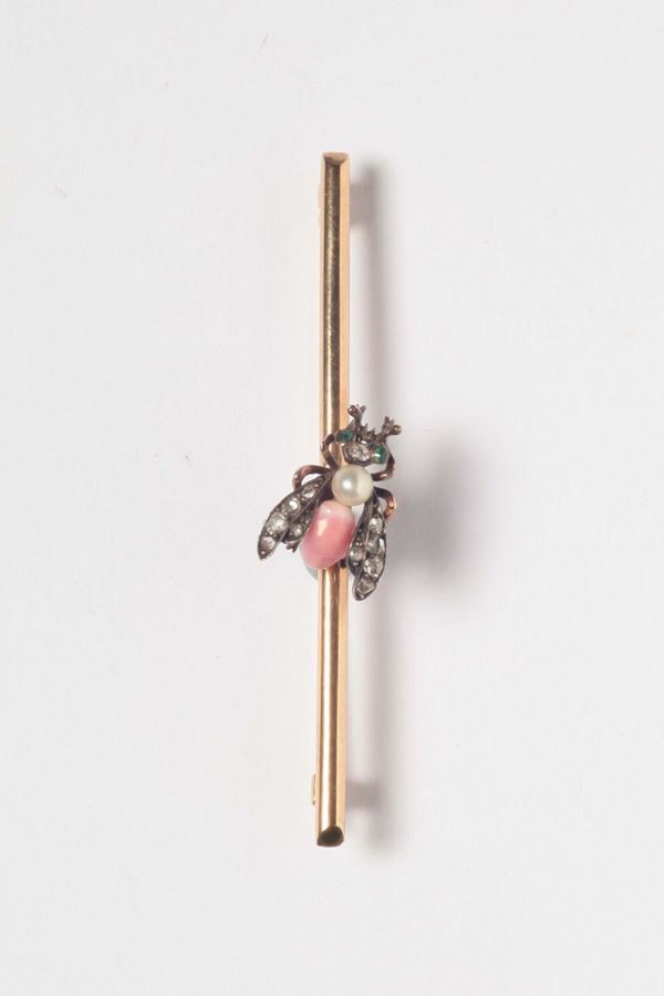 A pink pearl and diamond brooch