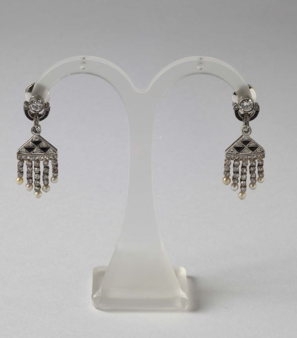 A pair of art deco style, diamonds, seed pearls, onix and platinum earrings
