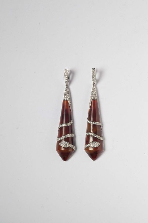 A pair of tortoiseshell and diamond pendant earrings