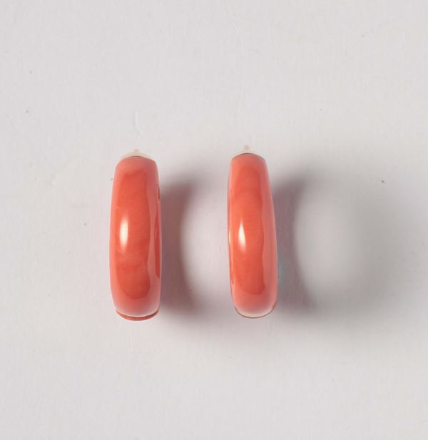A pair of coral earrings. Signed Van Cleef & Arpels