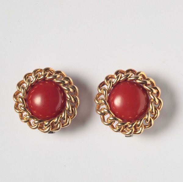 A coral and gold earrings