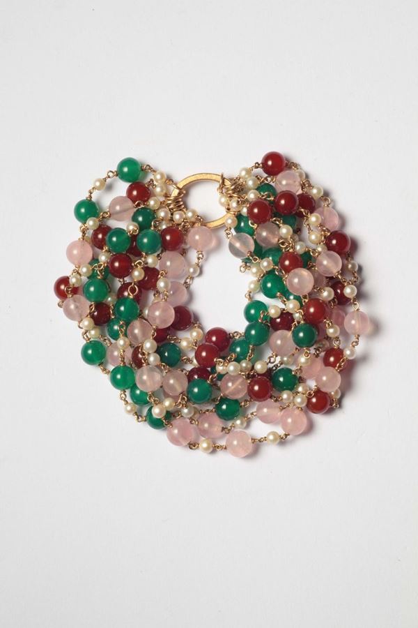 A coloured chalcedony, seed pearl and gold bracelet