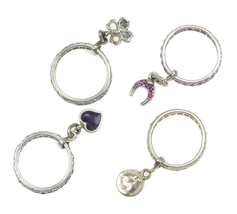 Four gem-set porte bonheur rings  - Auction Fine Art - Cambi Casa d'Aste