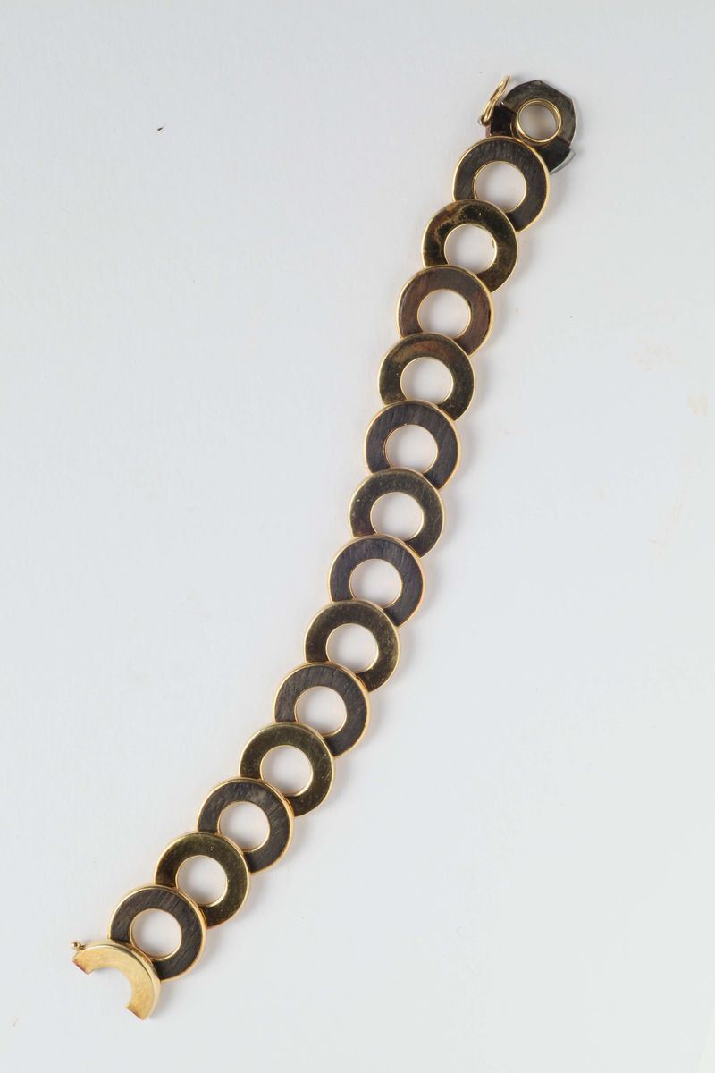 Bracciale a segmenti in legno ed oro giallo 750/1000  - Auction Ancient and Contemporary Jewelry and Watches - Cambi Casa d'Aste