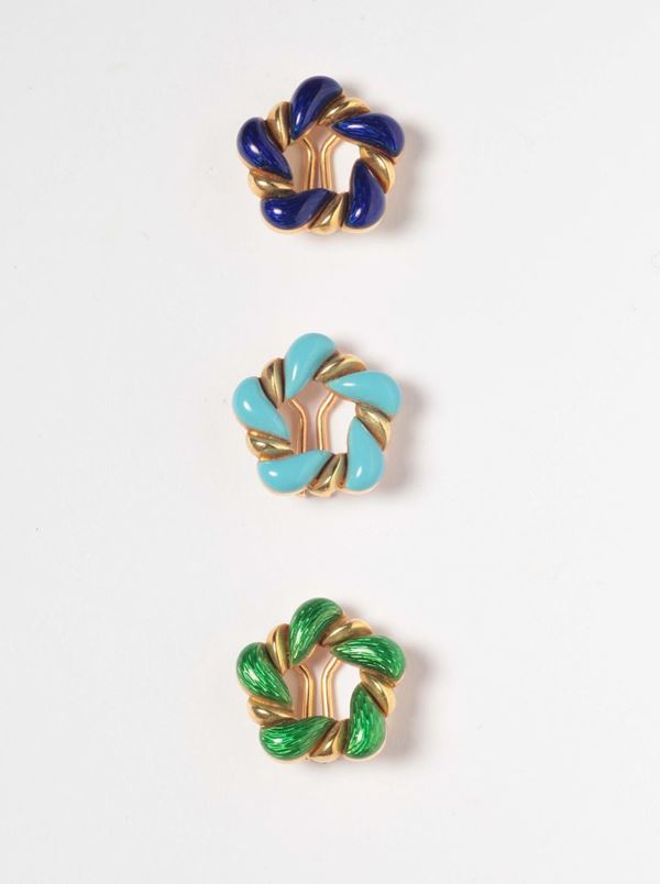 A three enamel and gold earrings