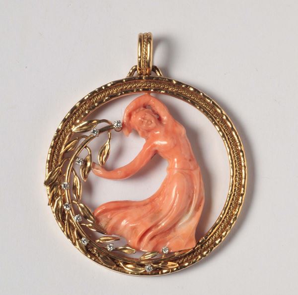 A coral, gold and diamond pendant