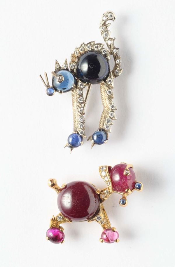 Two ruby and sapphire brooches