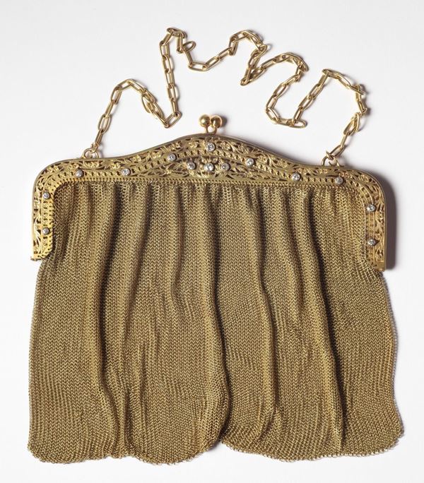 An early 20th century diamond and gold mesh bag