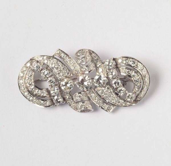 A old cut diamond and platinum brooch. 1930 circa