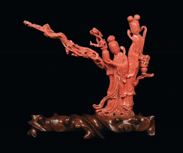 A red coral with two Guanyin figures with vases, China, Qing Dynasty, end 19th century