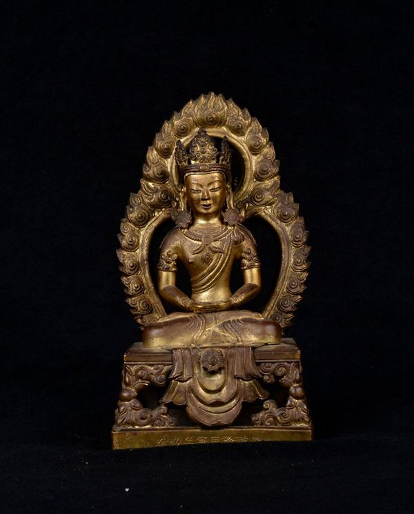 A gilt bronze figure of Amitayus with inscription, China, Qing Dynasty, Qianlong Period (1736-1795), Mark and the period