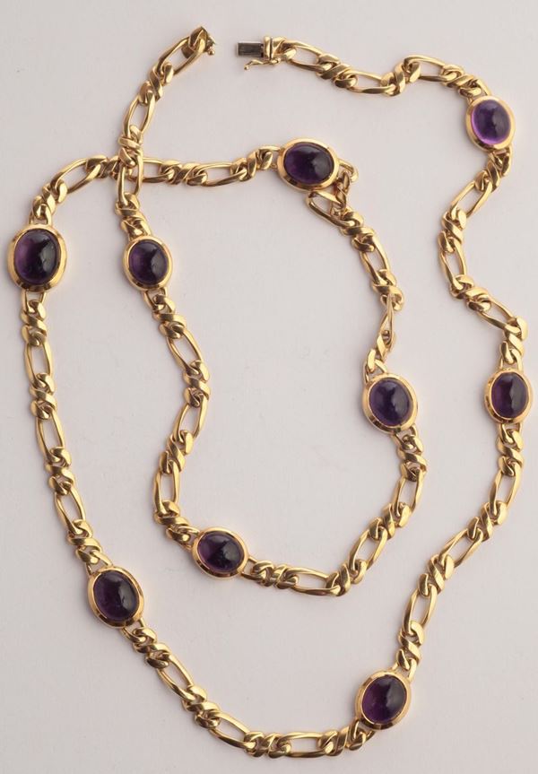 A natural amethyst and gold necklace