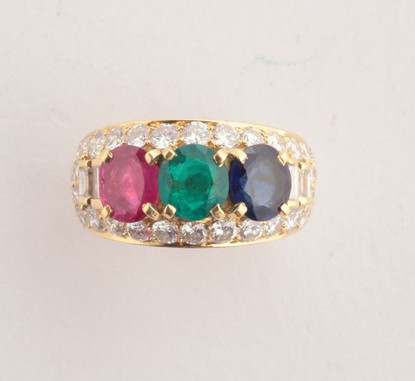 A diamond, sapphire, emerald and ruby ring. Signed Bulgari