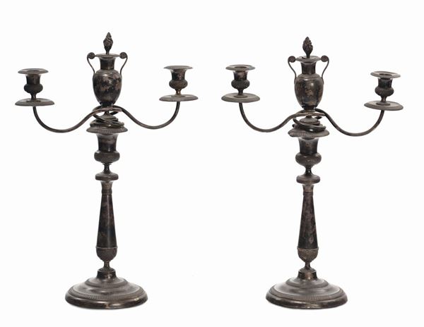 Coppia di candelieri in argento a tre luci, nord Italia XIX secolo