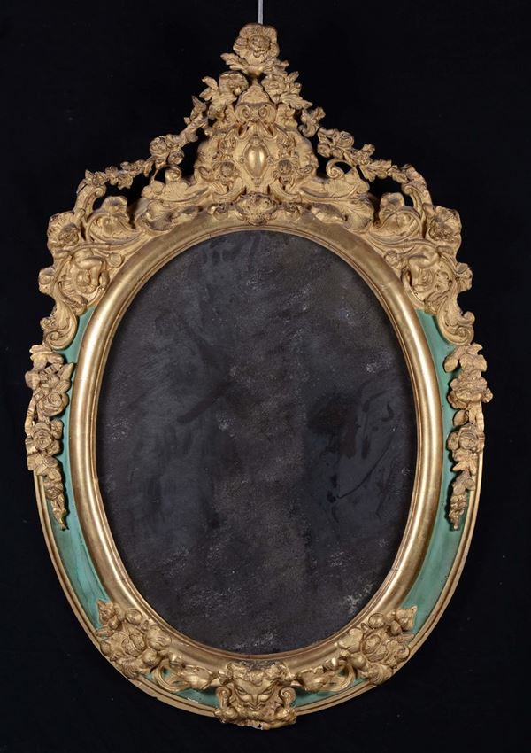 Specchiera dorata e laccata ovale, XIX secolo