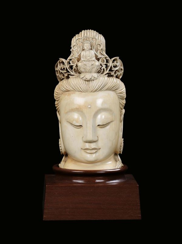 A carved ivory Guanyin head, China, Qing Dynasty, 19th century