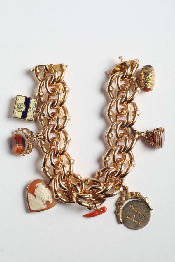 A gold charms bracelet