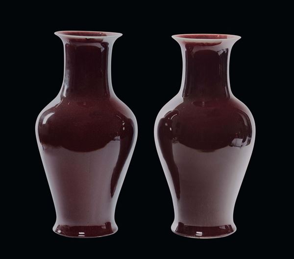 A pair of monochrome oxblood red vases, China, Qing Dynasty,  19th century