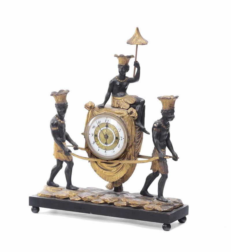 Orologio in legno intagliato con moretti, XVIII secolo  - Asta Arredi e Oggetti d'Arte da Importanti Collezioni Private - Cambi Casa d'Aste