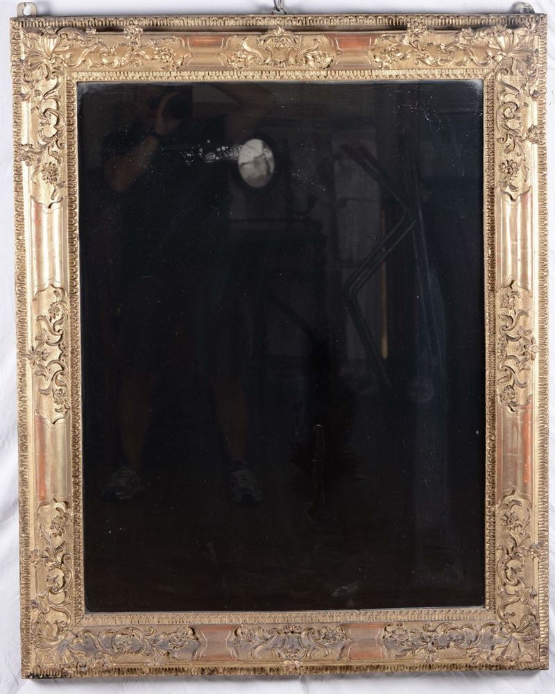 Specchiera intagliata e dorata, XIX secolo  - Asta Arredi e Oggetti d'Arte da Importanti Collezioni Private - Cambi Casa d'Aste