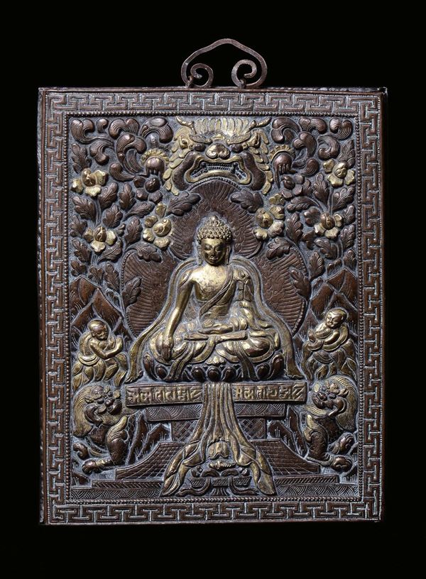 An embossed copper “Buddha” plate, China, Qing Dynasty, 18th century